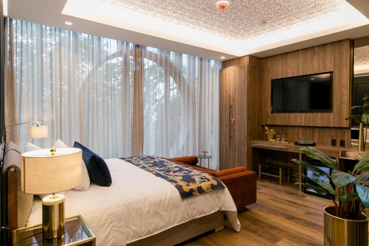 Hotel Marquee Medellín Exterior foto A bedroom at the hotel